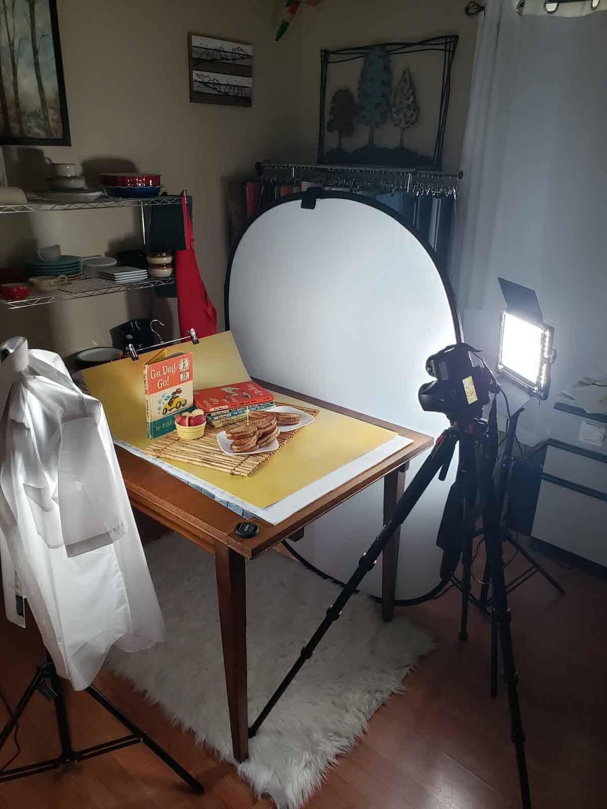Setting up the scene with props and lighting for the grilled sunbutter sanwich photo shoot.