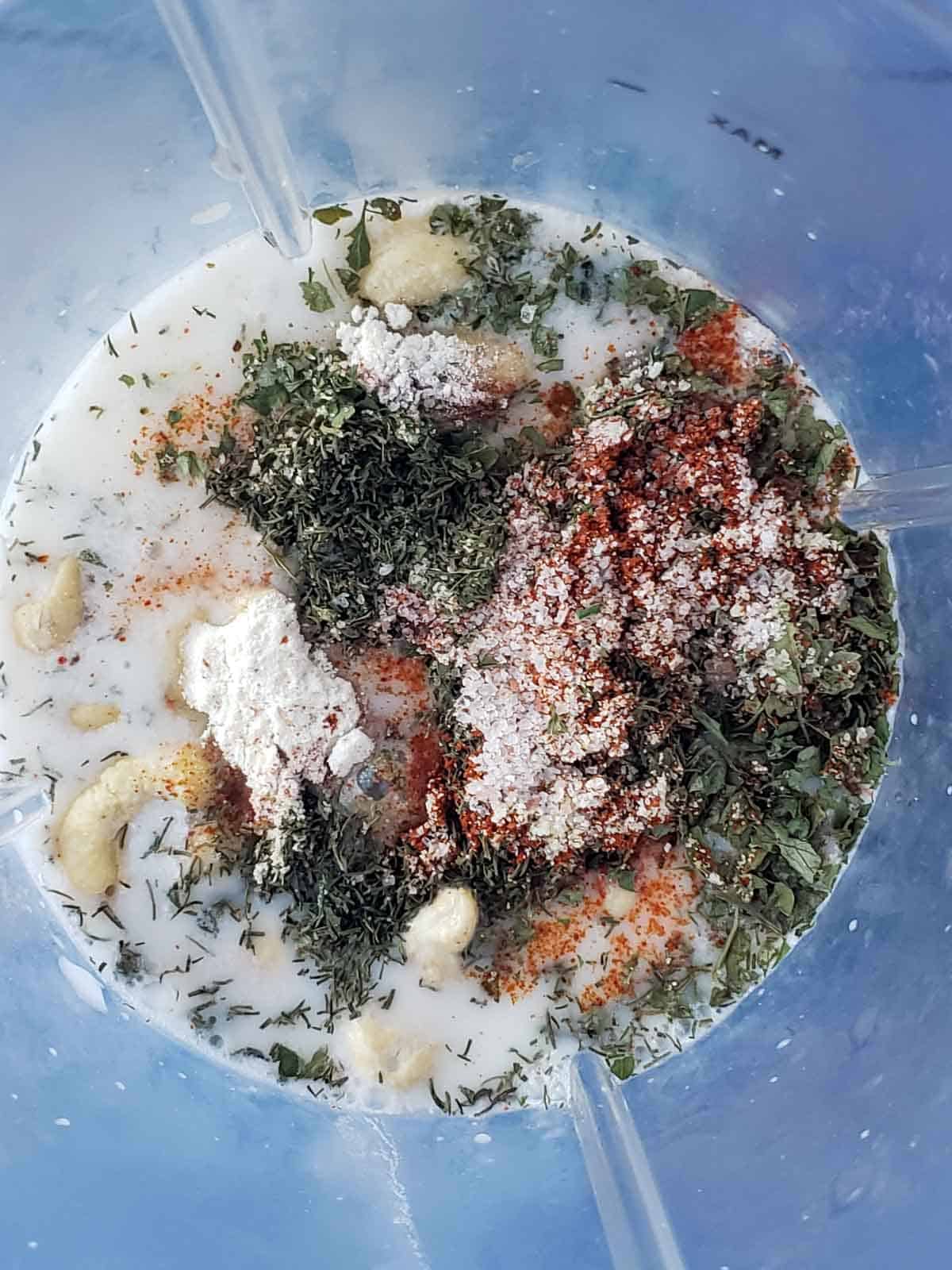 Dairy free Ranch dressing ingredients all ready to be blended into a creamy ranch dressing perfect for salads and wraps.