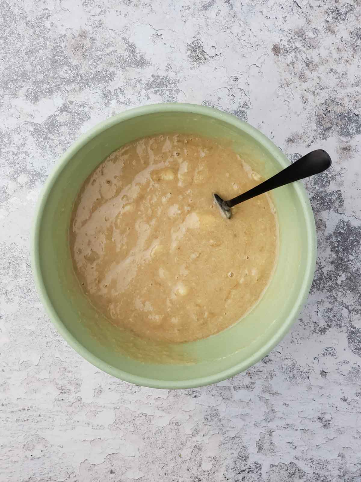 Smooth wet mixture after combining mashed bananas, maple syrup, and cashew butter.