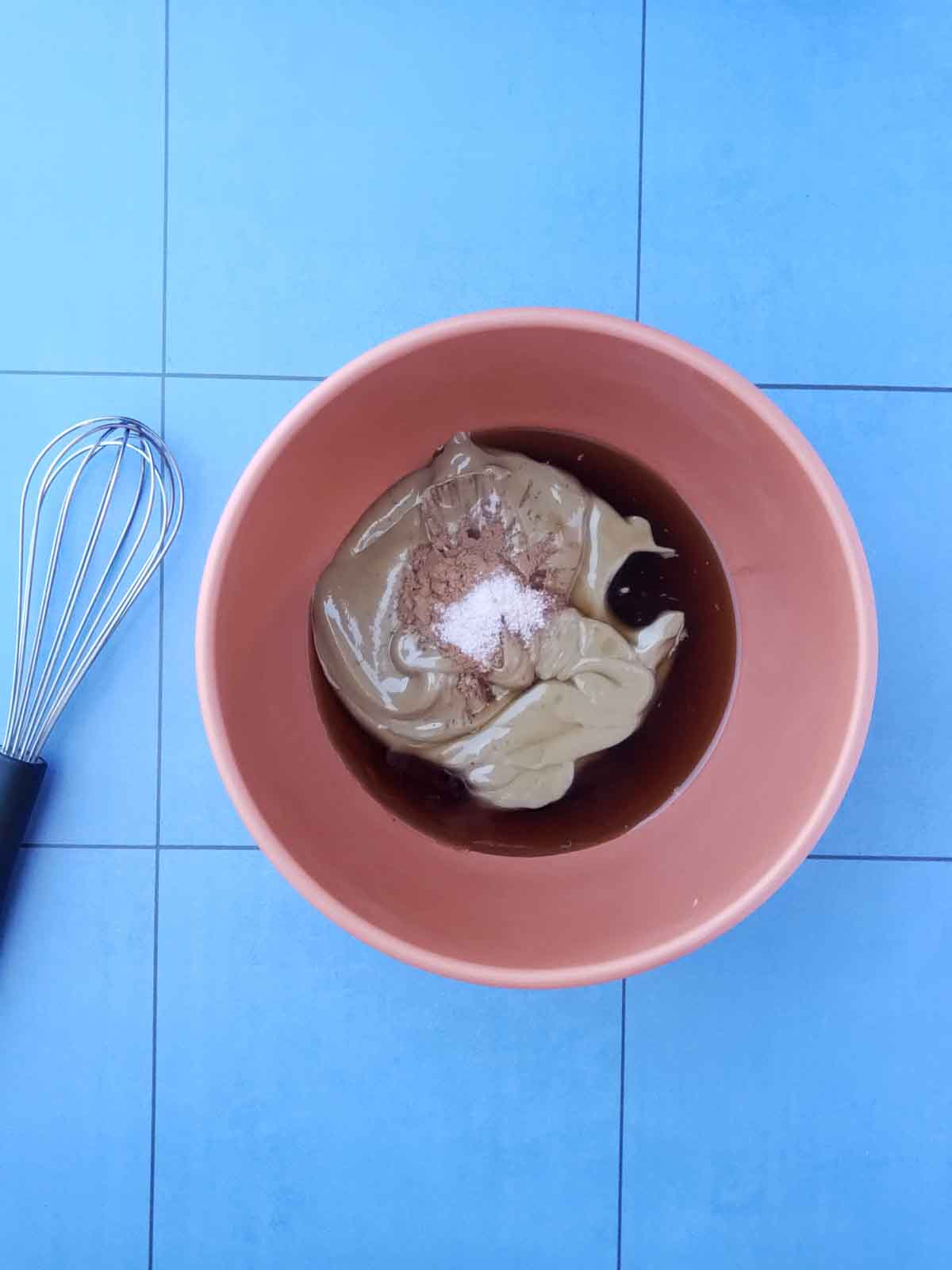 Sunbutter, maple syrup, cinnamon, and salt in a mixing bowl before stirring.