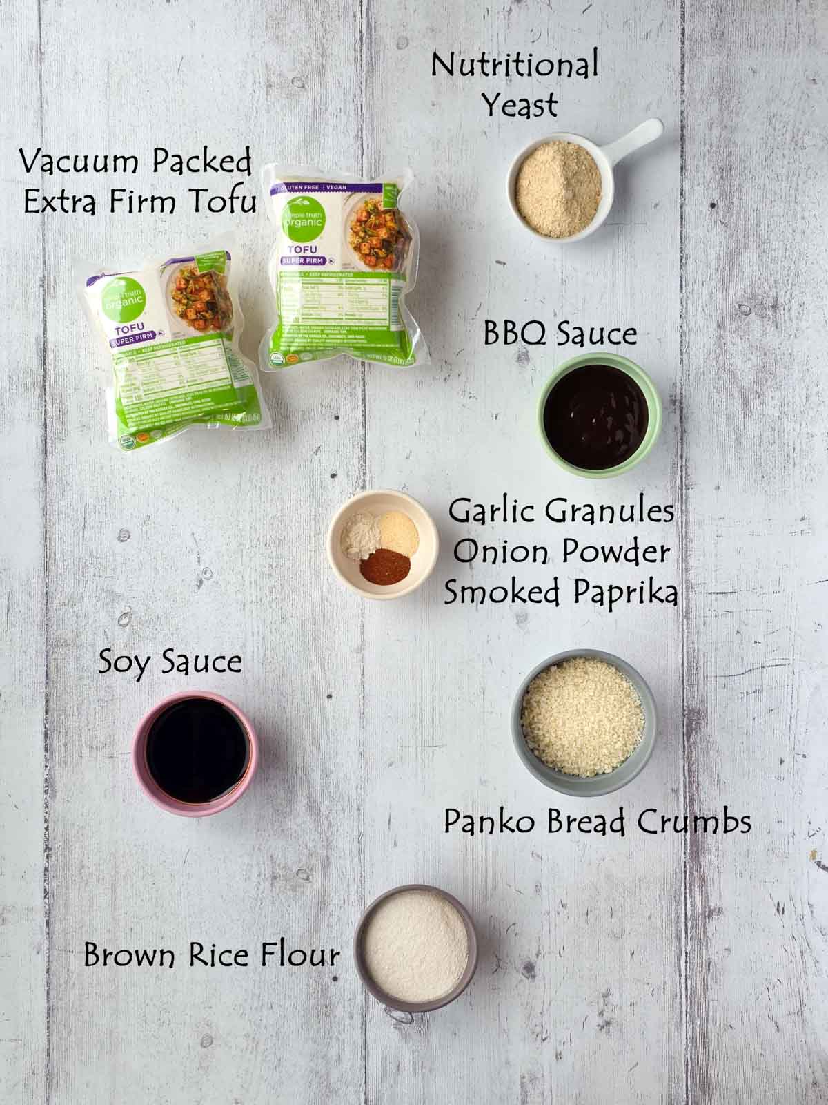 Labeled ingredients including vacuum-packed extra firm tofu, panko, brown rice flour, BBQ sauce, soy sauce, nutritional yeast, and spices.