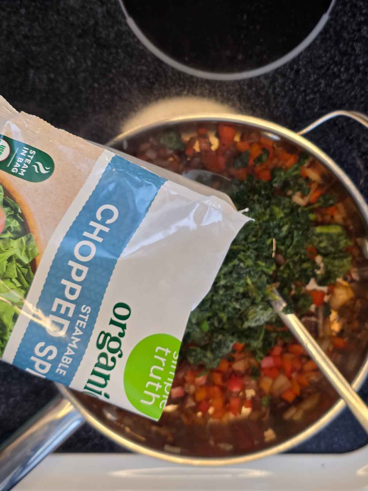 Frozen chopped spinach added directly to the skillet with sautéed vegetables.