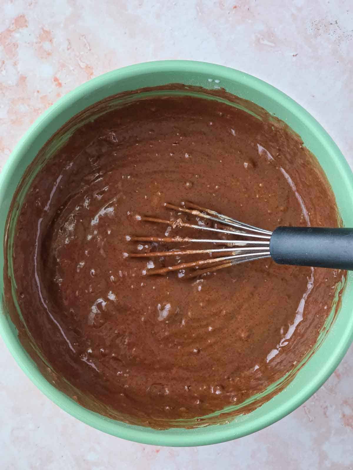 Chocolate cupcake batter mixed in one bowl and ready for baking.