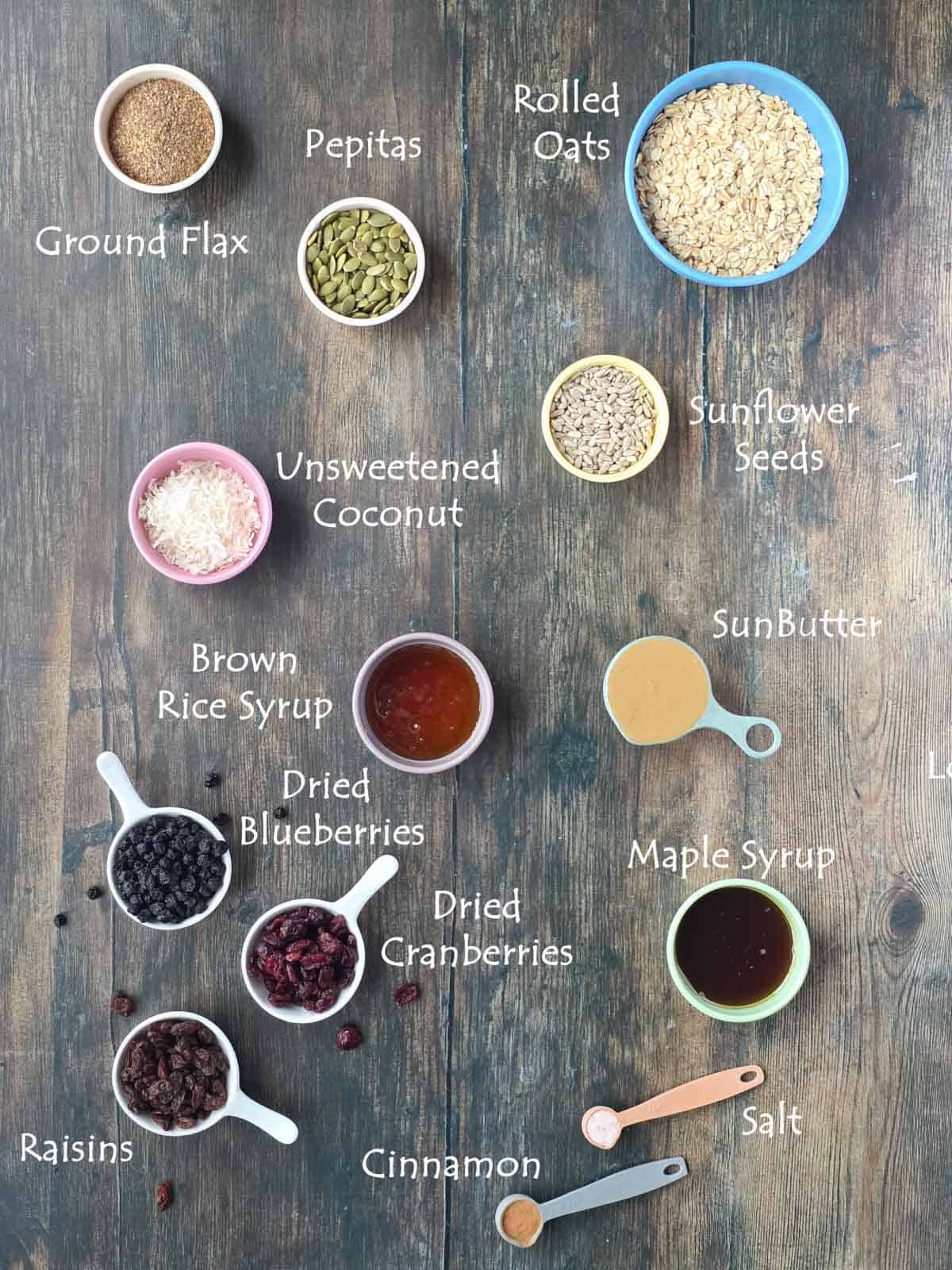 Flat lay of labeled ingredients for making Triple Berry Granola Bars.